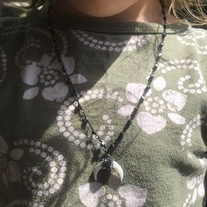 Black crescent necklace